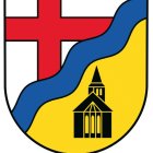 Wappen der Ortsgemeinde Lasel: rotes Kreuz auf weißem Hintergrund oben links, blauer Wellenlinie diagonal, unten rechts gelber Bereich mit schwarzer Kirche.