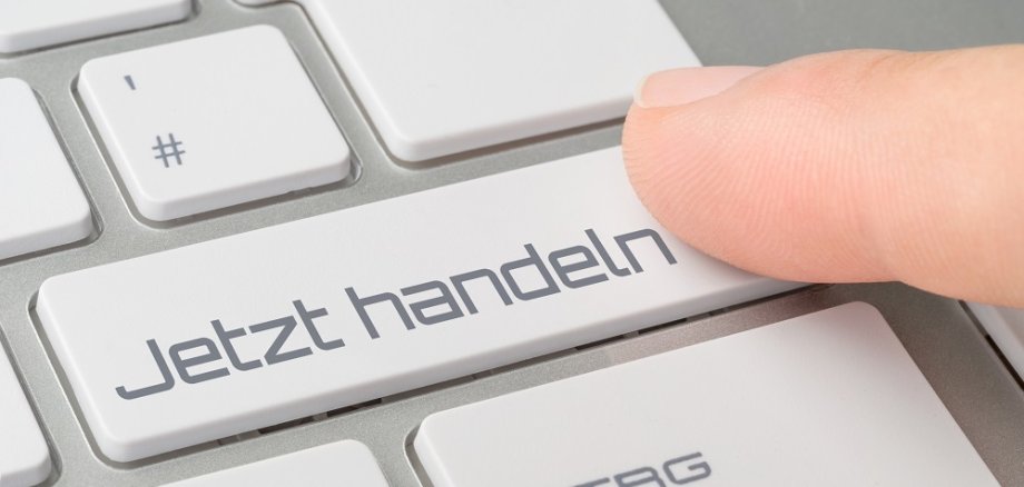 Tastatur mit beschrifteter Taste - Jetzt handeln